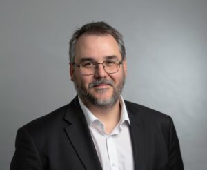 Head and shoulders portrait of Dr. Iain Darby